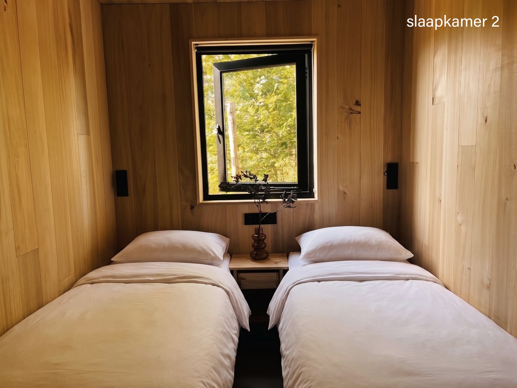 Slaapkamer twee met zacht bedlinnen